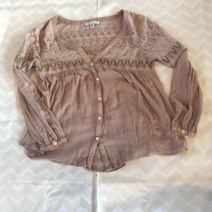 A blush pink blouse